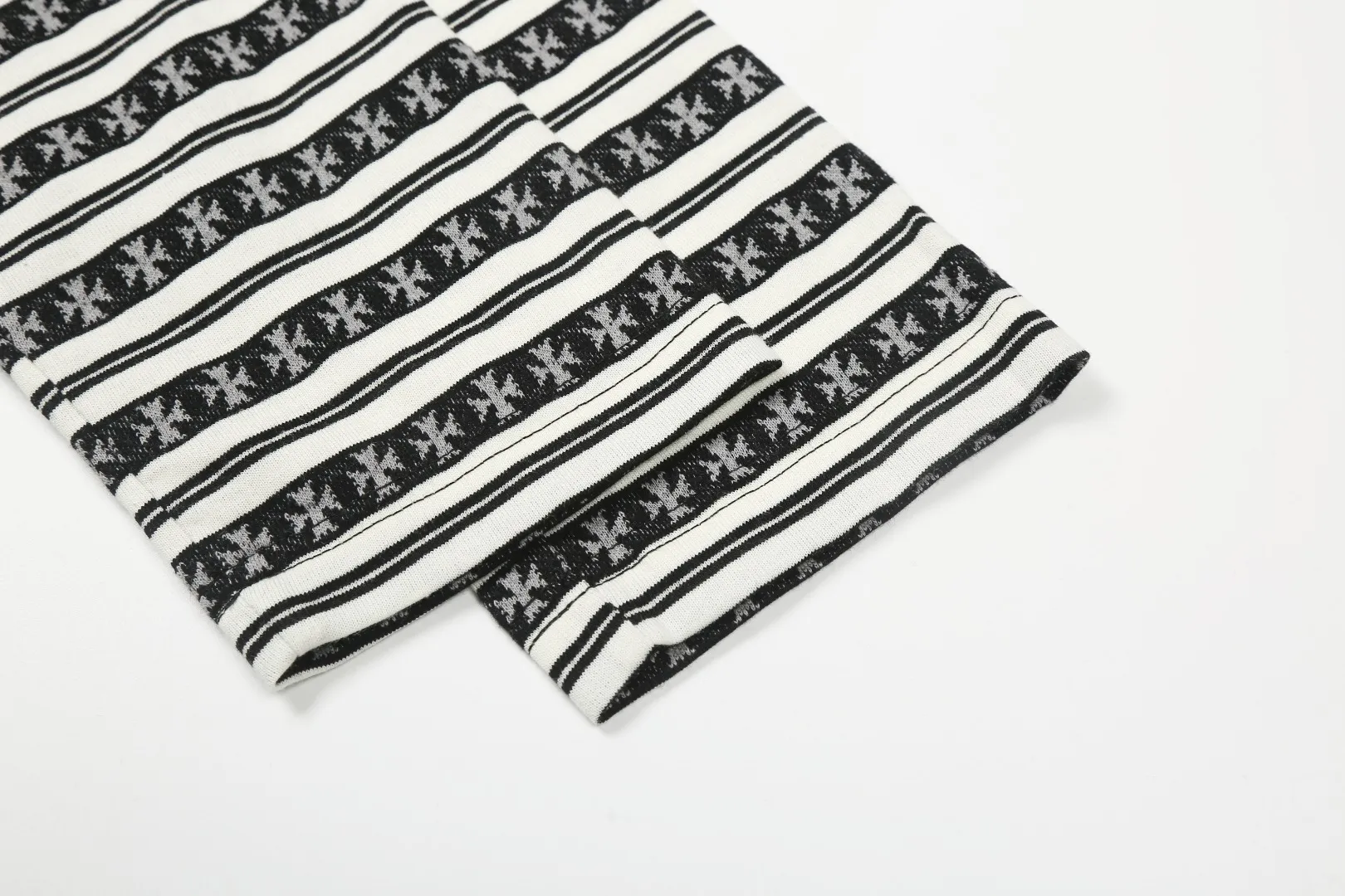 P210 White background picture [Popular item] Code: 25020# Color: Black/Pink/Blue Size: S to - CH Croix heart niche design cross jacquard striped long sleeves brings striped Polo to Next Levels. Loose fit. Same style for men and women. Lazy and casual. Street style. Three colors. Customized style.